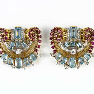 Pair of gold, blue topaze, ruby and diamonds clip brooch by Boucheron