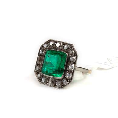 Emerald and diamond platinum ring